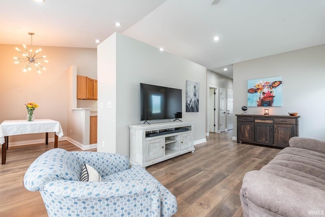 1423 W Westwind Ct, Bloomington, IN 47403 - living area featuring a chandelier, wood finished floors, and recessed lighting