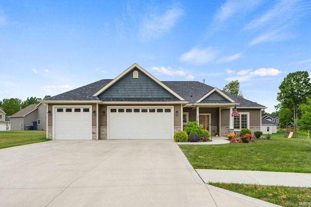 215 Mockingbird Ln, Warsaw, IN 46580 - craftsman-style house featuring stone siding, an attached garage, a front lawn, and concrete driveway