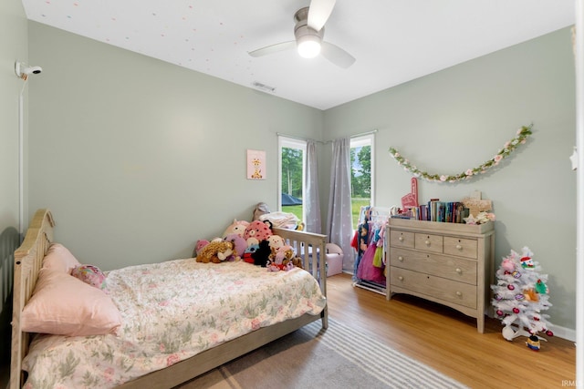 215 Mockingbird Ln, Warsaw, IN 46580 - bedroom featuring wood finished floors and a ceiling fan