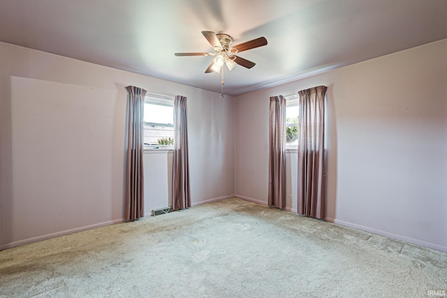 6412 E Oak St, Evansville, IN 47715 - spare room with carpet floors and ceiling fan