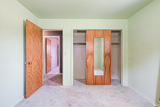 6412 E Oak St, Evansville, IN 47715 - unfurnished bedroom featuring carpet floors and a closet