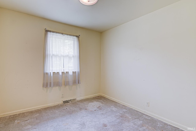 6412 E Oak St, Evansville, IN 47715 - carpeted spare room featuring baseboards