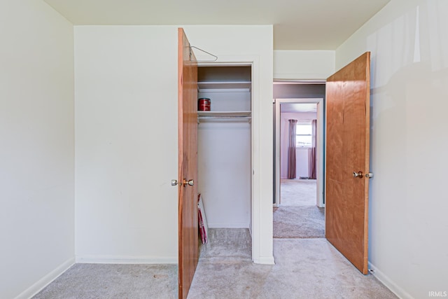 6412 E Oak St, Evansville, IN 47715 - unfurnished bedroom featuring light colored carpet and a closet