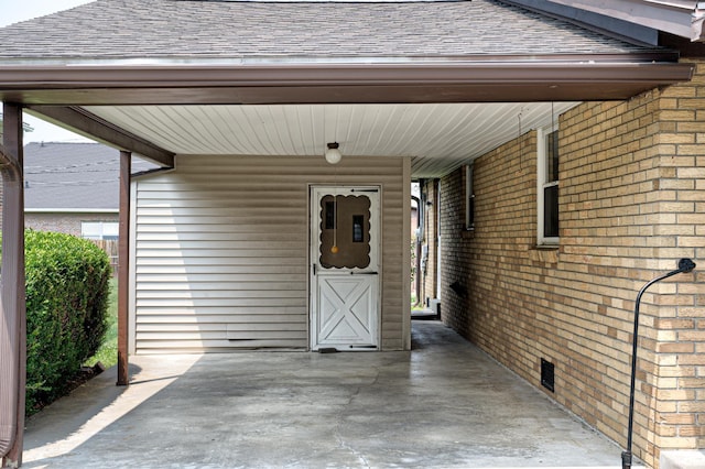 6412 E Oak St, Evansville, IN 47715 - property entrance featuring a shingled roof and brick siding
