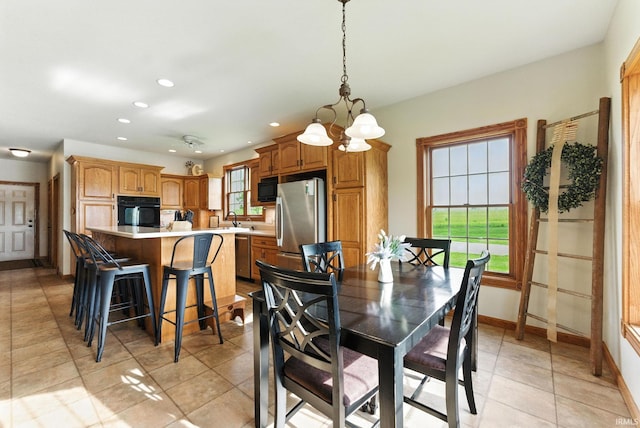 5595 N State Road 109, Columbia City, IN 46825 - dining room with a chandelier, recessed lighting, and light tile patterned flooring