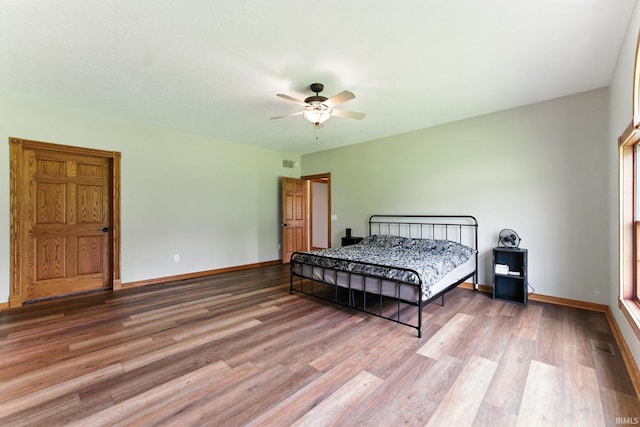 5595 N State Road 109, Columbia City, IN 46825 - bedroom featuring wood finished floors and ceiling fan