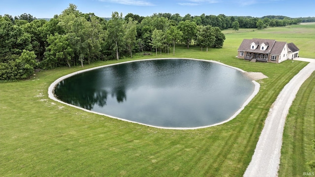 5595 N State Road 109, Columbia City, IN 46825 - surrounding community with curved driveway, a lawn, and a water view