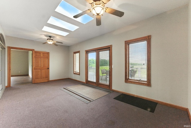 5595 N State Road 109, Columbia City, IN 46825 - spare room with carpet flooring, a ceiling fan, and a skylight