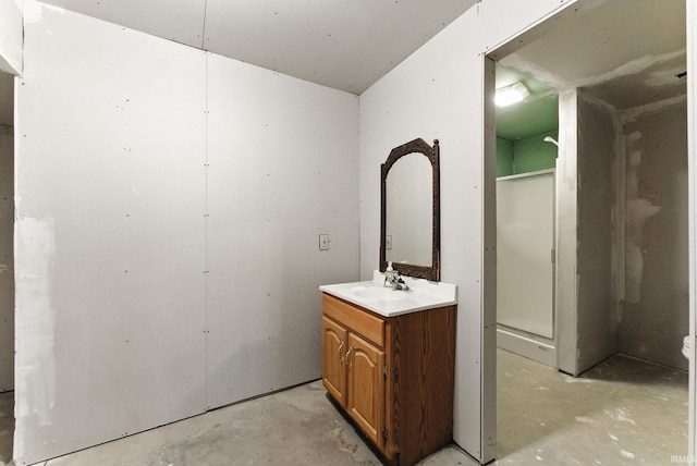 5595 N State Road 109, Columbia City, IN 46825 - full bath featuring unfinished concrete flooring, vanity, and a shower stall