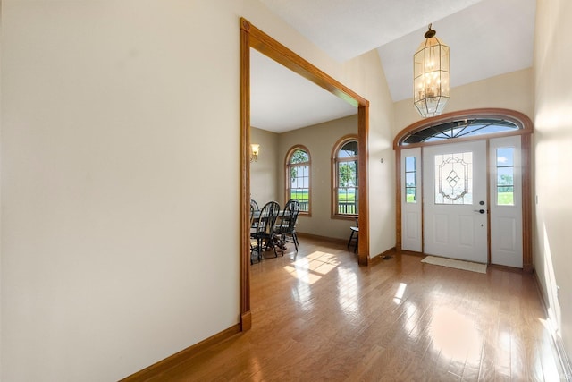 5595 N State Road 109, Columbia City, IN 46825 - entrance foyer with a chandelier and light wood finished floors
