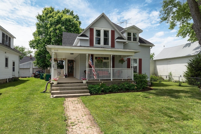 102 E Peterson St, Otterbein, IN 47970 - view of front of house featuring a porch and roof with shingles