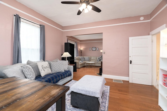 102 E Peterson St, Otterbein, IN 47970 - living room with wood finished floors and a ceiling fan