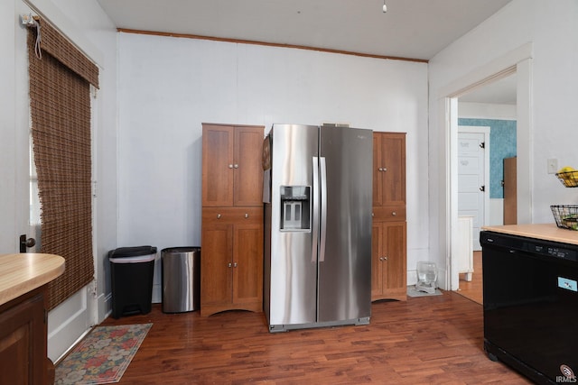 102 E Peterson St, Otterbein, IN 47970 - kitchen featuring stainless steel fridge with ice dispenser, dishwasher, dark wood finished floors, brown cabinets, and light countertops
