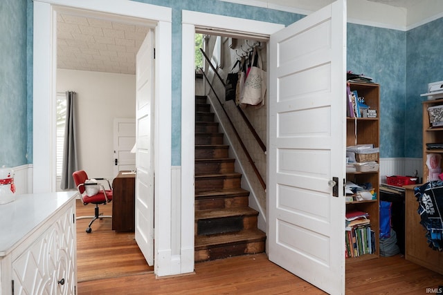 102 E Peterson St, Otterbein, IN 47970 - stairway featuring wood finished floors and a wainscoted wall