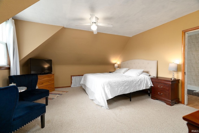 102 E Peterson St, Otterbein, IN 47970 - bedroom with vaulted ceiling, ceiling fan, and light carpet