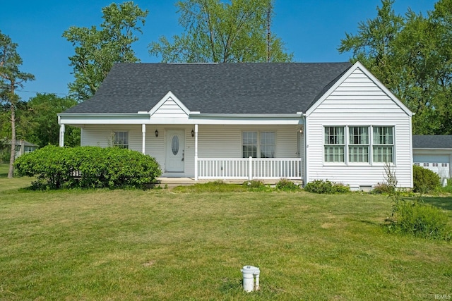 7404 N State Road 13, North Webster, IN 46555 - view of front of house with a porch, a front lawn, and roof with shingles