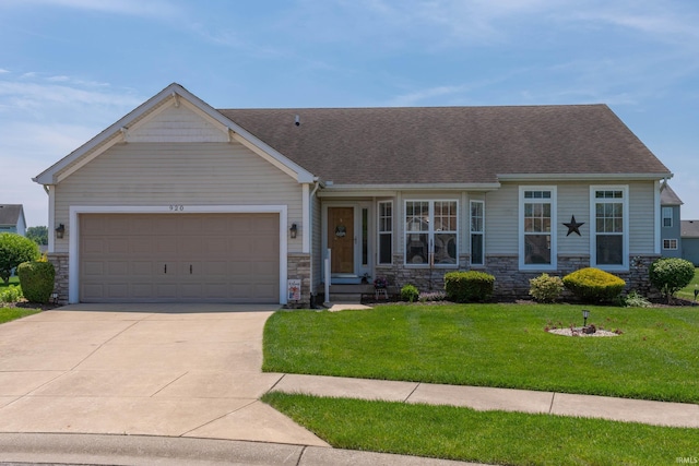 920 Cary Ct, South Bend, IN 46614 - view of front of house featuring stone siding, concrete driveway, a front lawn, and a garage