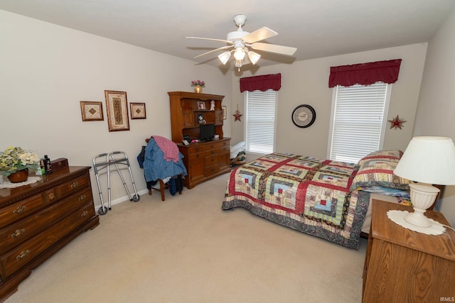 920 Cary Ct, South Bend, IN 46614 - bedroom featuring light colored carpet and a ceiling fan
