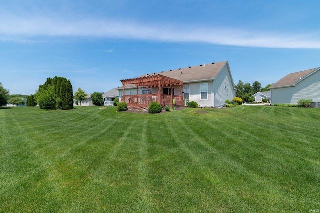 920 Cary Ct, South Bend, IN 46614 - back of property with a pergola, a lawn, and a deck