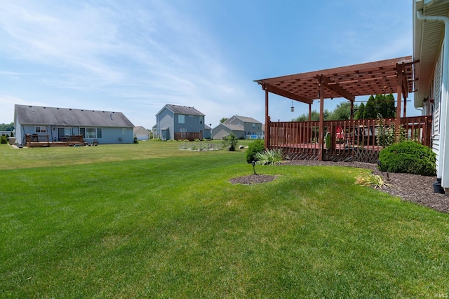920 Cary Ct, South Bend, IN 46614 - view of green lawn with a pergola, a wooden deck, and a residential view