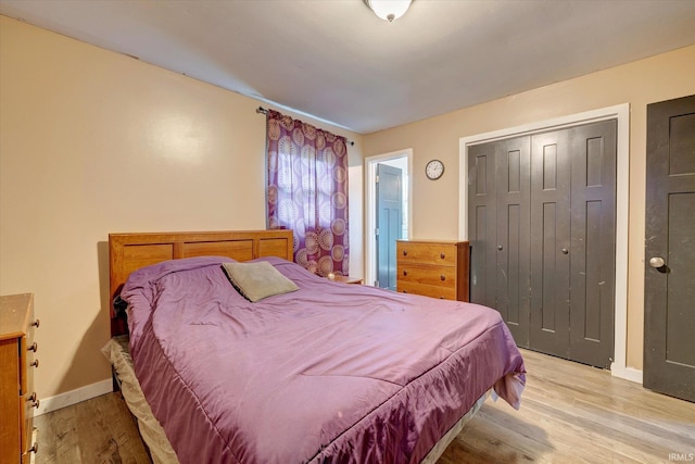 3121 S Yonkers St, Bloomington, IN 47403 - bedroom with light wood-style floors and a closet