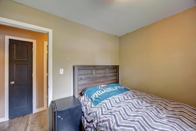 3121 S Yonkers St, Bloomington, IN 47403 - bedroom featuring wood finished floors and baseboards