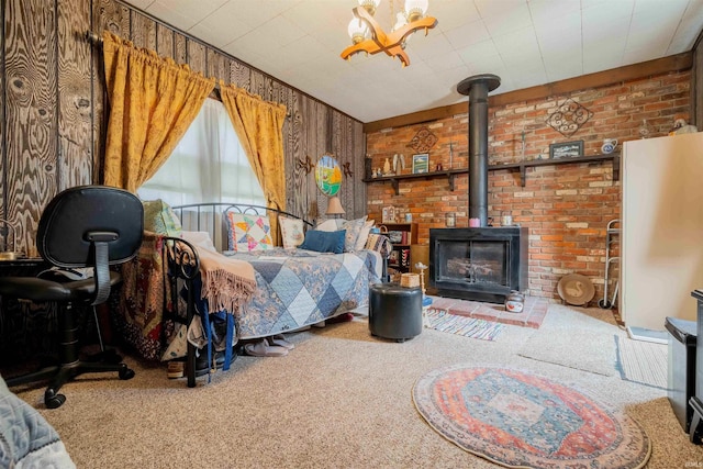 609 S Miller Ave, Marion, IN 46953 - bedroom with carpet and a wood stove
