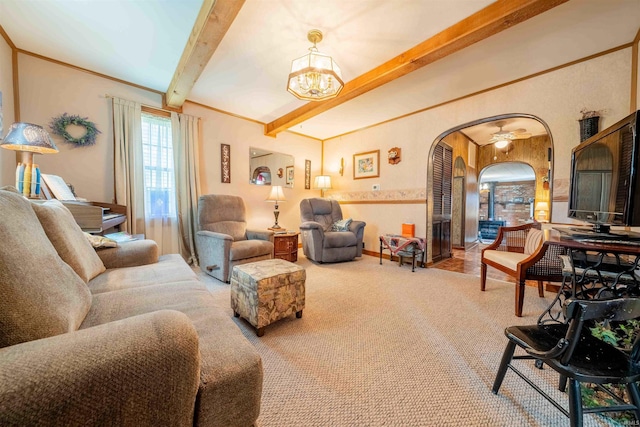 609 S Miller Ave, Marion, IN 46953 - living area with beam ceiling, carpet floors, arched walkways, and a chandelier