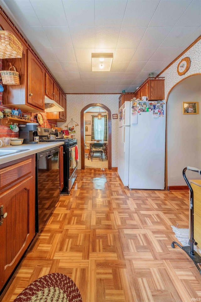 609 S Miller Ave, Marion, IN 46953 - kitchen with arched walkways, freestanding refrigerator, dishwasher, wallpapered walls, and brown cabinetry