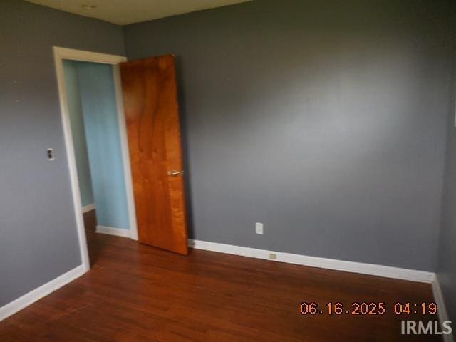 1608 Sunset Dr, Rochester, IN 46975 - unfurnished room featuring wood finished floors and baseboards