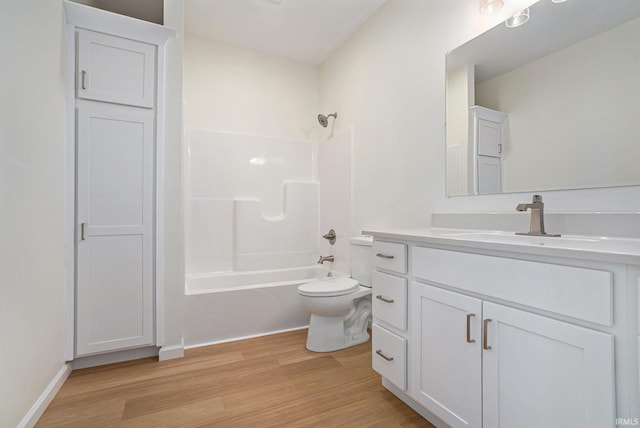 54207 Starner Ave, Elkhart, IN 46514 - bathroom with vanity, wood finished floors, and washtub / shower combination