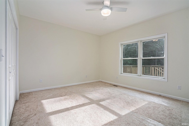 54207 Starner Ave, Elkhart, IN 46514 - empty room featuring light carpet and ceiling fan