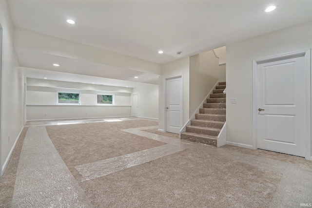 54207 Starner Ave, Elkhart, IN 46514 - unfurnished living room featuring stairway and recessed lighting