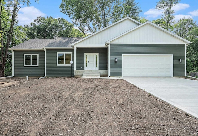 54207 Starner Ave, Elkhart, IN 46514 - view of front of property with driveway and an attached garage