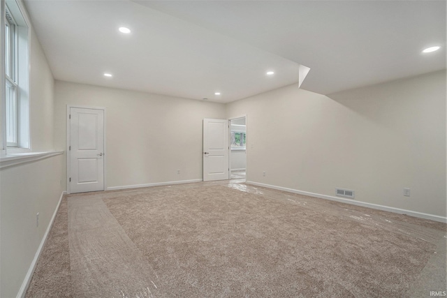 54207 Starner Ave, Elkhart, IN 46514 - spare room featuring light colored carpet and recessed lighting