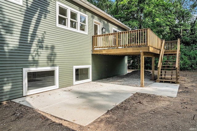 54207 Starner Ave, Elkhart, IN 46514 - rear view of property with a patio, a wooden deck, and stairway