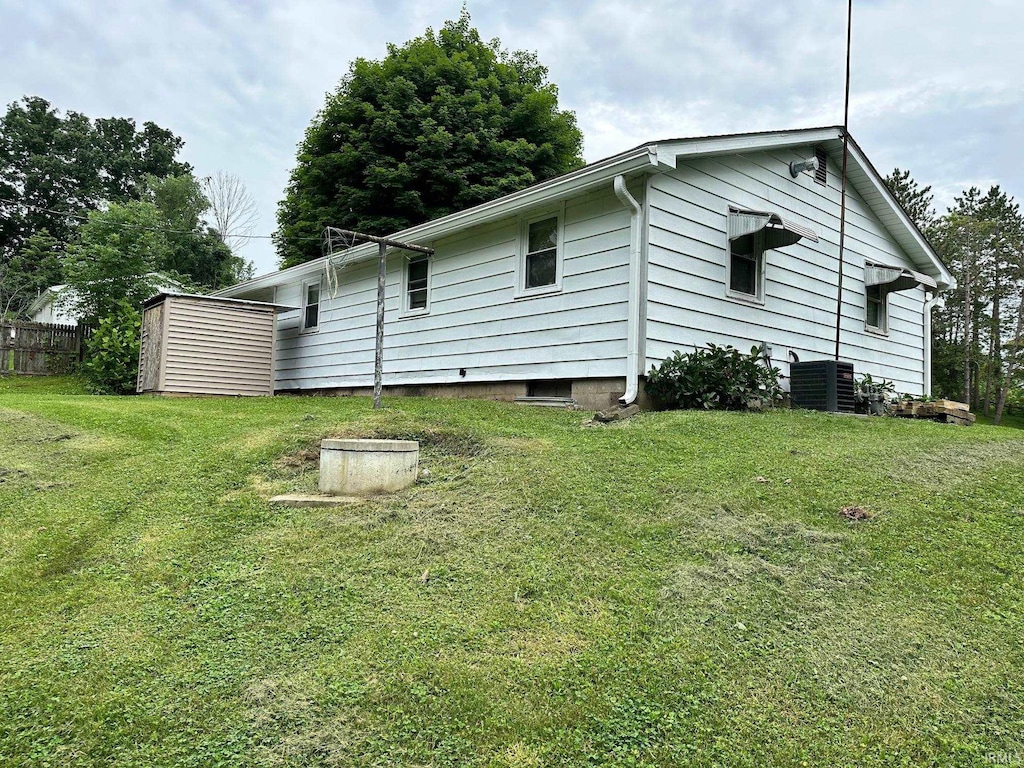 1165 Freeman Rd, Spencer, IN 47460 - back of house featuring a yard