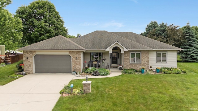 1321 Lost Lock Way, New Haven, IN 46774 - view of front facade featuring brick siding, a porch, an attached garage, concrete driveway, and roof with shingles