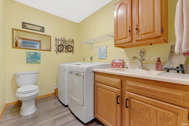 1321 Lost Lock Way, New Haven, IN 46774 - laundry area with washing machine and dryer and light wood finished floors