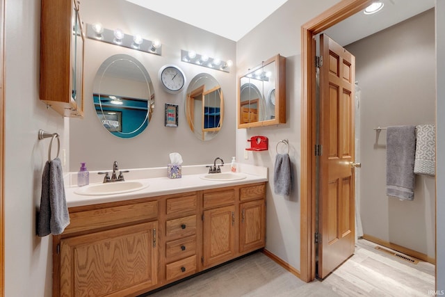 1321 Lost Lock Way, New Haven, IN 46774 - full bathroom featuring double vanity and wood finished floors