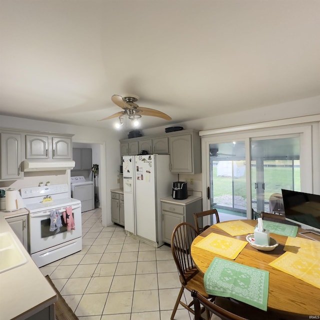 125 Ruby Rd, Attica, IN 47918 - kitchen with white appliances, washer / dryer, light tile patterned flooring, a ceiling fan, and light countertops