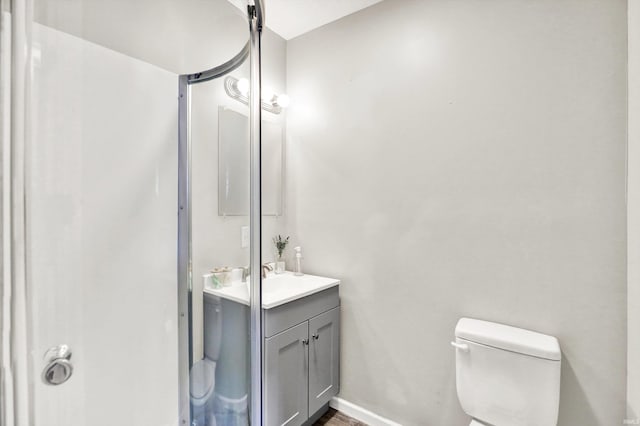 26 E Plum St, Anderson, IN 46012 - bathroom featuring vanity and toilet