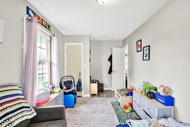26 E Plum St, Anderson, IN 46012 - rec room featuring wood finished floors and baseboards