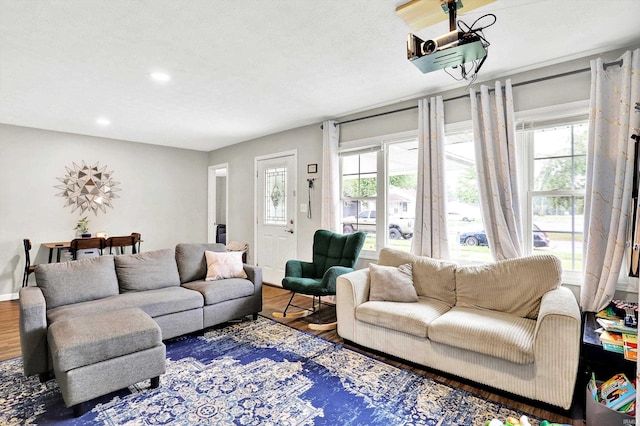 26 E Plum St, Anderson, IN 46012 - living room with plenty of natural light, wood finished floors, and recessed lighting