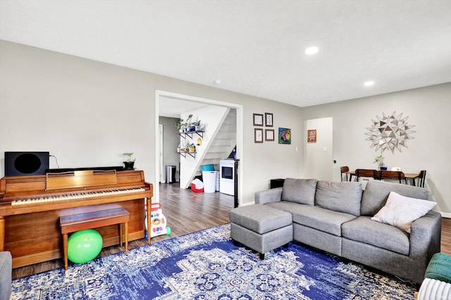 26 E Plum St, Anderson, IN 46012 - living area featuring wood finished floors, stairway, and recessed lighting
