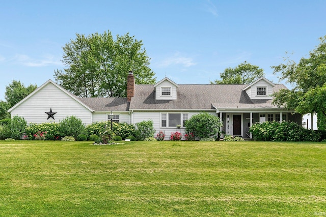 6830 County Road 40, Butler, IN 46721 - cape cod home featuring a front lawn, a chimney, and roof with shingles