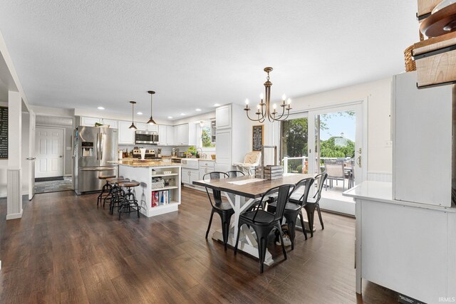 6830 County Road 40, Butler, IN 46721 - dining area with dark wood finished floors, a chandelier, healthy amount of natural light, and recessed lighting
