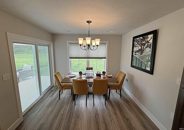 9 Beacon Way, Washington, IN 47501 - dining area featuring a chandelier and dark wood-style flooring