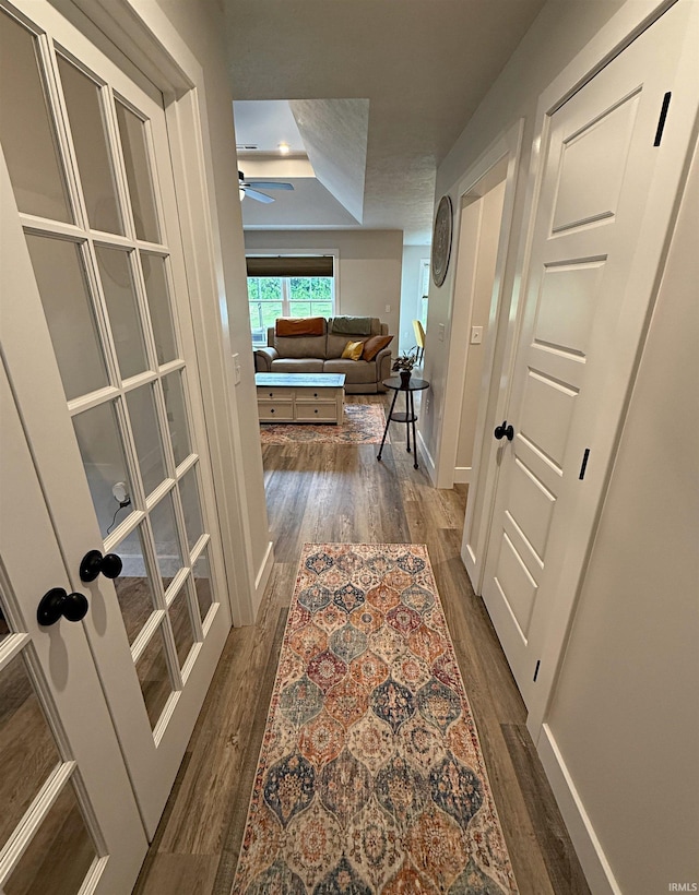 9 Beacon Way, Washington, IN 47501 - hallway featuring dark wood finished floors and a tray ceiling