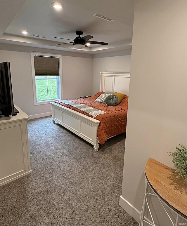 9 Beacon Way, Washington, IN 47501 - bedroom with dark colored carpet, recessed lighting, a raised ceiling, and a ceiling fan